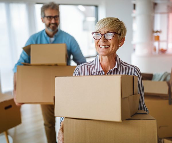 Upstate-Finance-Corp-Couple-Carrying-Moving-Boxes